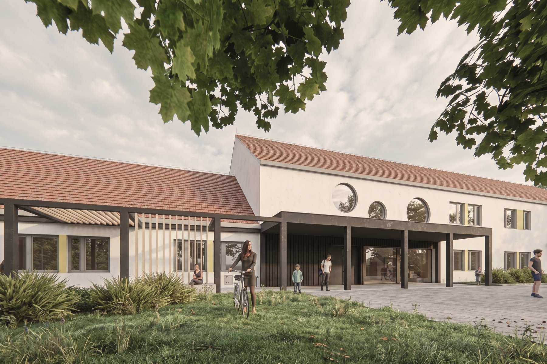 Główna elewacja szkoły Happy House z nowoczesnym wejściem, zadaszeniem i zielenią - projekt ASM Architekt.