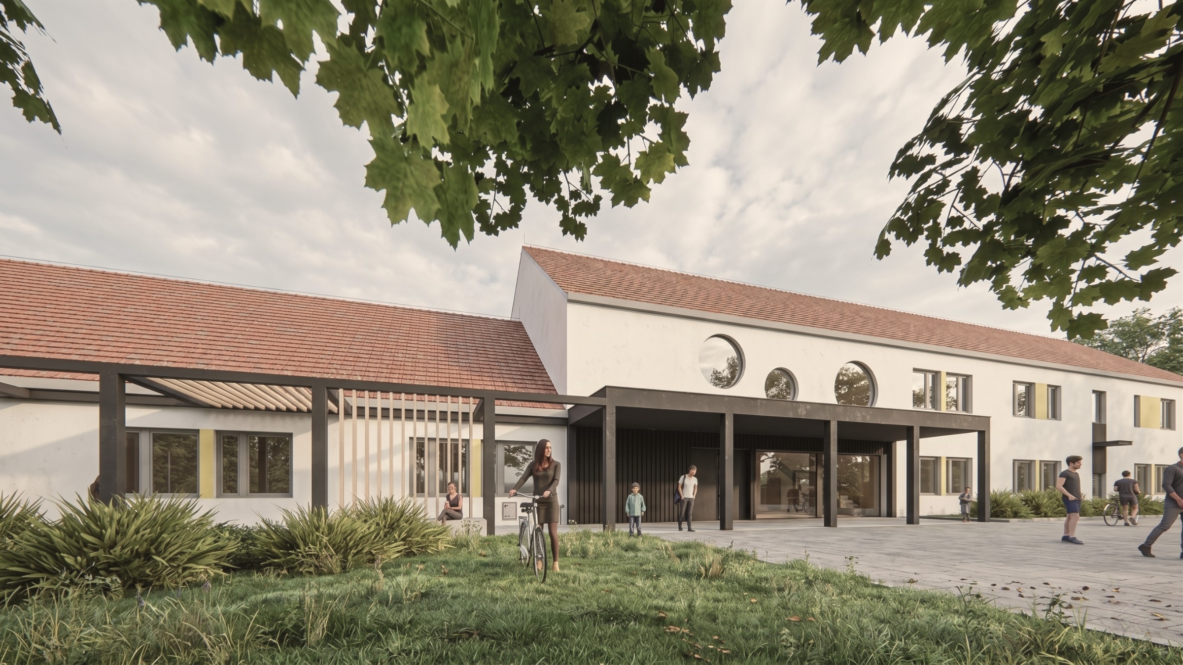 Główna elewacja szkoły Happy House z nowoczesnym wejściem, zadaszeniem i zielenią - projekt ASM Architekt.